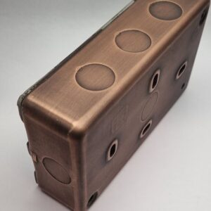 Side view of 2-gang antique copper surface-mounted electrical box.